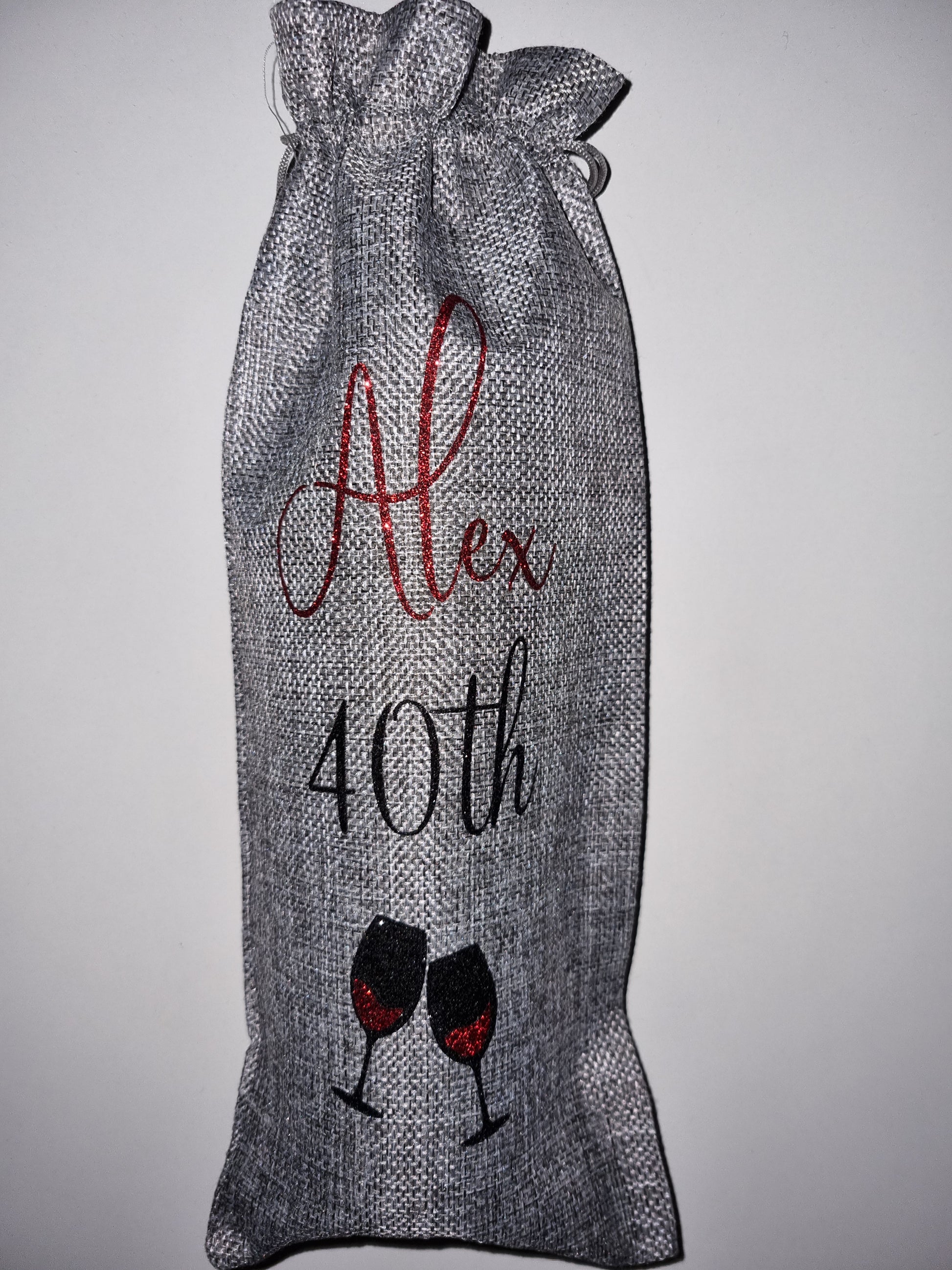 Luxury personalised eco-friendly burlap wine bottle gift bag, decorated in stunning HTV glitter vinyl, luxury gift for any occasion that makes any bottle of bubbly or wine feel special.