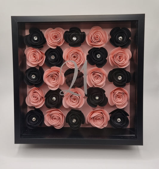 Elevate your gifting experience with our meticulously crafted 3D Personalised Luxury Shadow Boxes, a testament to timeless elegance and heartfelt sentiment. Each shadow box display is created with premium cardstock and adorned with intricately made hand-rolled flowers.