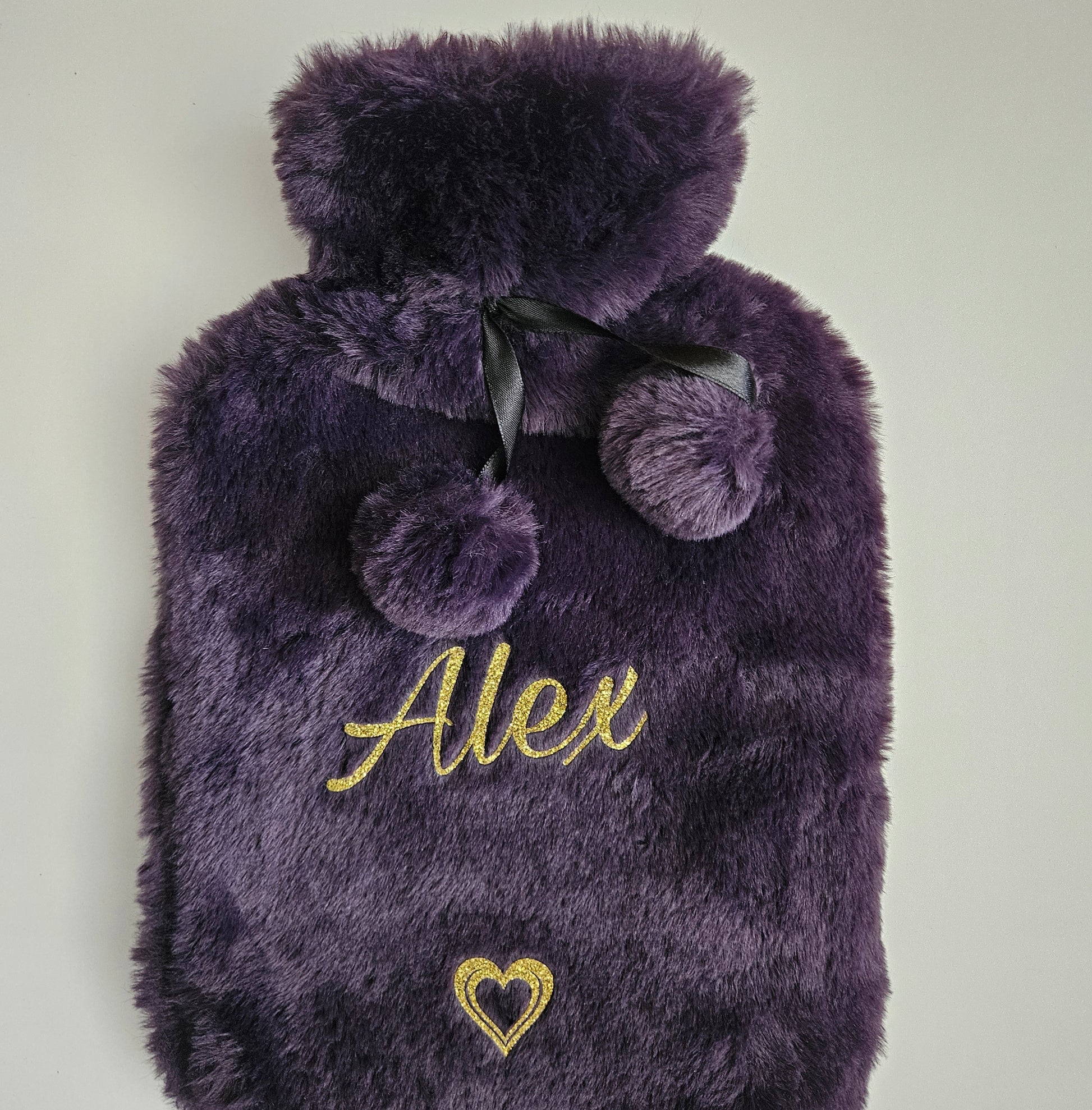 Experience ultimate comfort with our plush personalised hot water bottles, wrapped in a luxurious removeable faux fur cover. Ideal for gifting, each bottle is custom-made to add a special touch to warmth.