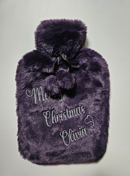 Stay cosy and warm this winter with our luxury personalised xmas hot water bottles. Featuring ultra soft removable covers with pom poms.