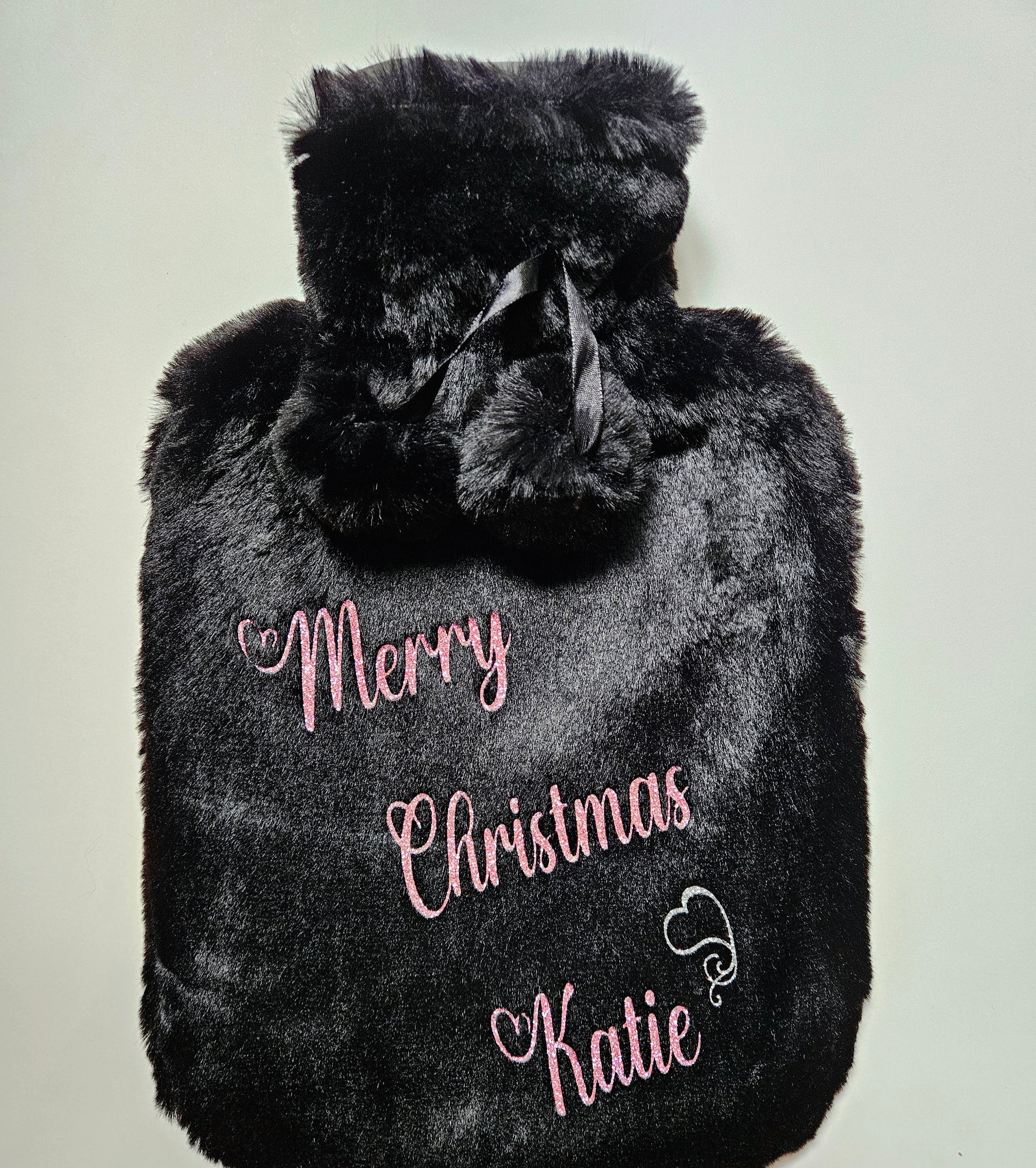 Stay cosy and warm this winter with our luxury personalised xmas hot water bottles. Featuring ultra soft removable covers with pom poms.